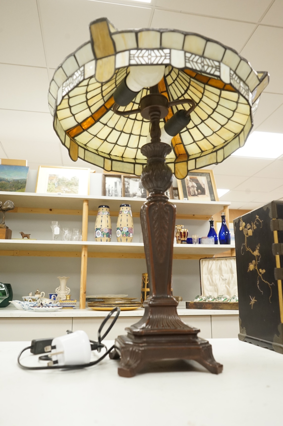 A bronze-effect Tiffany style leaded table lamp, 67cm high